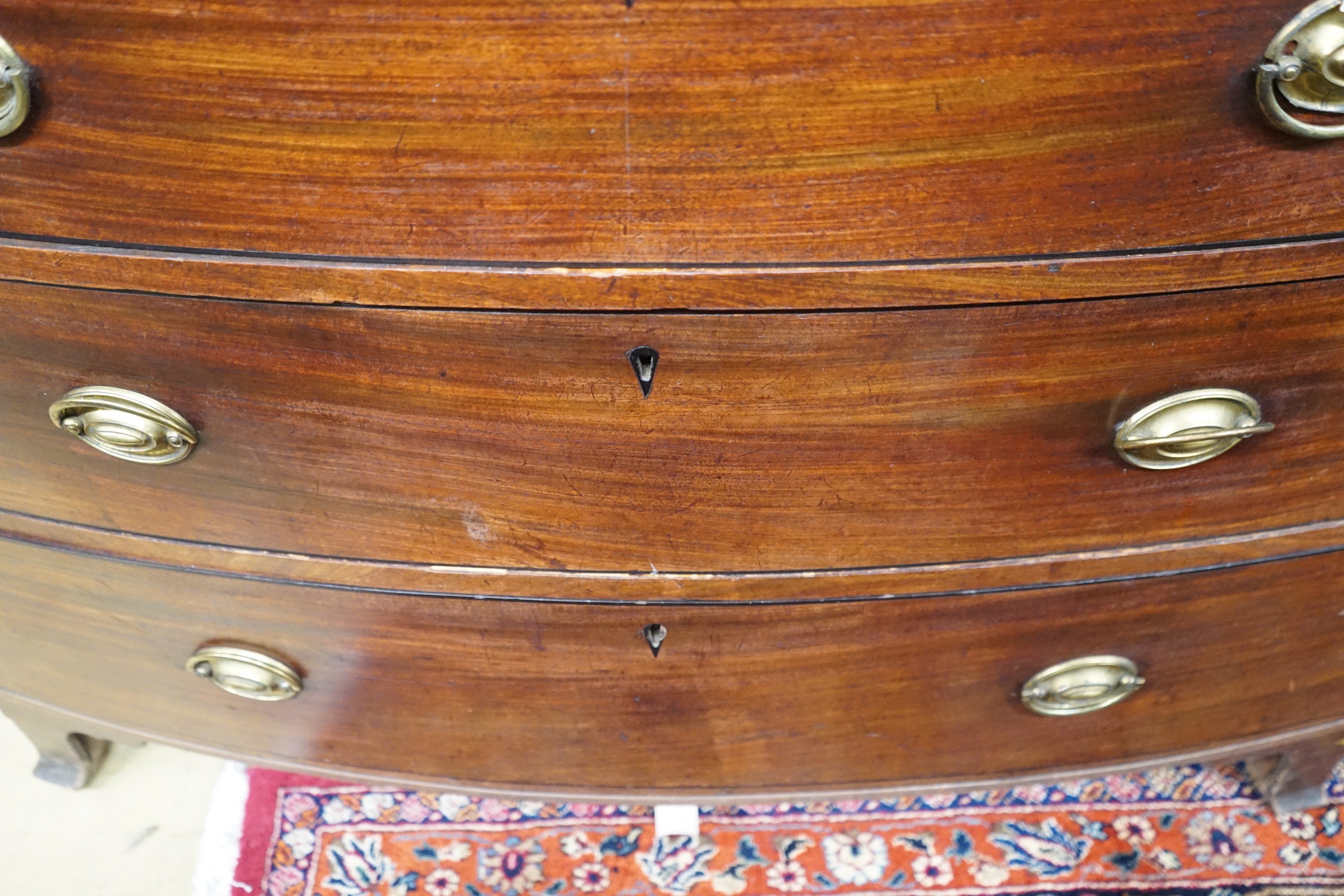 A Regency mahogany bow front chest of drawers, width 116cm, depth 59cm, height 109cm